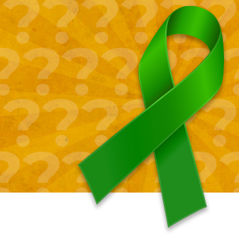 Green cerebral palsy awareness ribbon over background of question marks