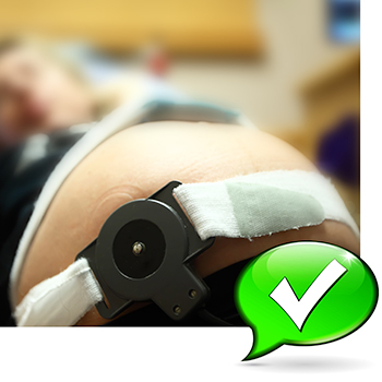 Woman with fetal heart monitor in place with green thought bubble and check mark in foreground