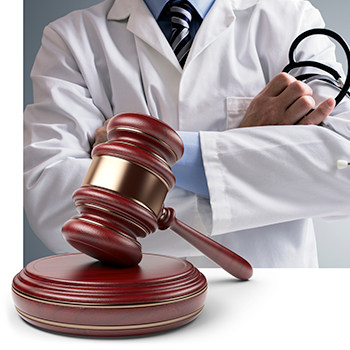 Judges gavel in front of photo of doctor with arms crossed