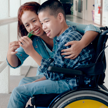 Child with cerebral palsy in therapy