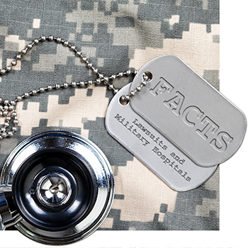 Stethoscope and dog tags on camo fatigues background