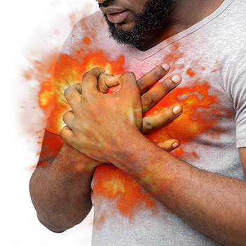 Young Black male holding chest with burst of fire behind his hands